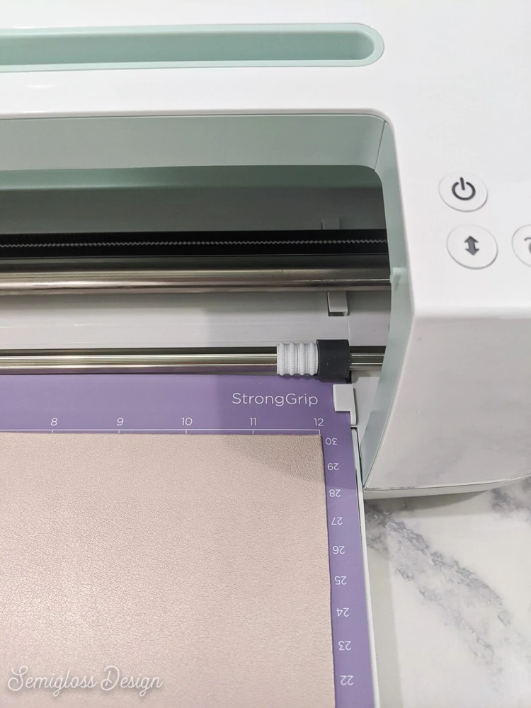 loading mat into cricut maker