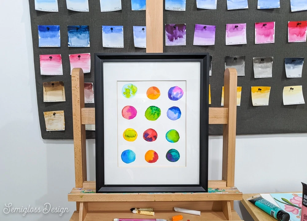 watercolor dot art on easel