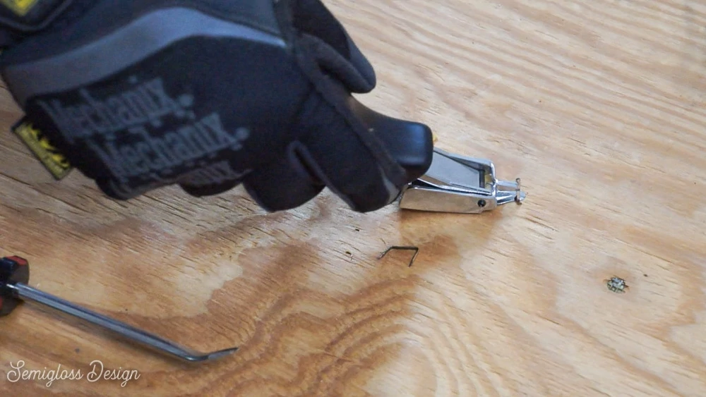 removing staples from subfloor after ripping out carpet