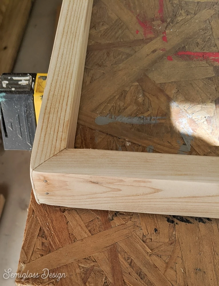 wood frame nailed together at corner