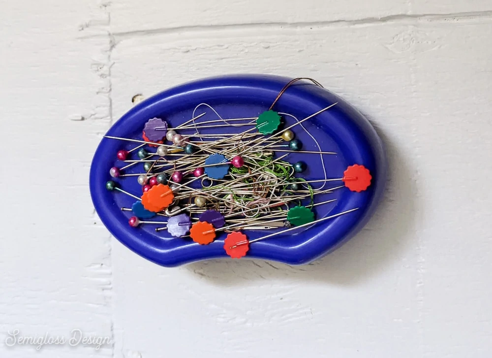 blue magnetic pincushion with pins