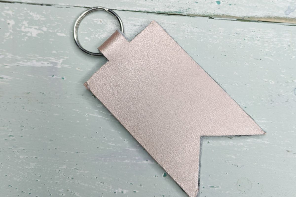 rose gold leather keychain in a flag shape