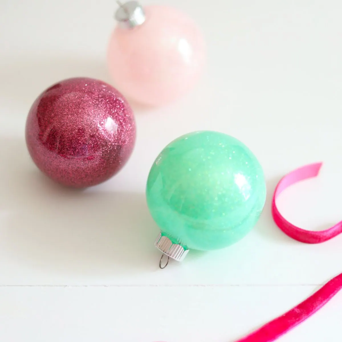 glitter ornaments in Christmas colors