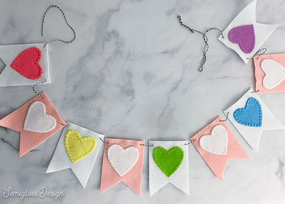 felt heart banner on marble background