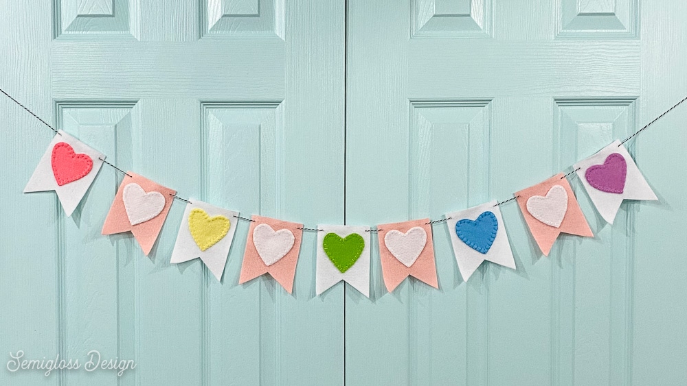 heart banner on blue doors