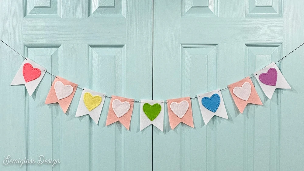 heart banner on blue doors