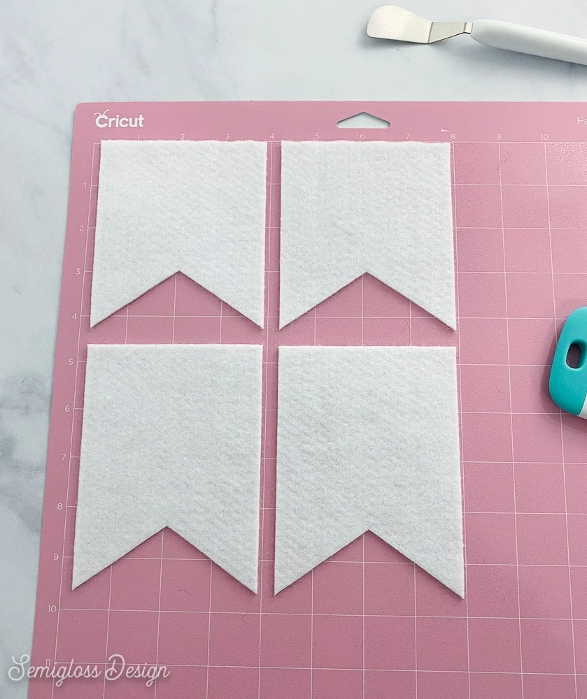 white felt flags on cricut mat