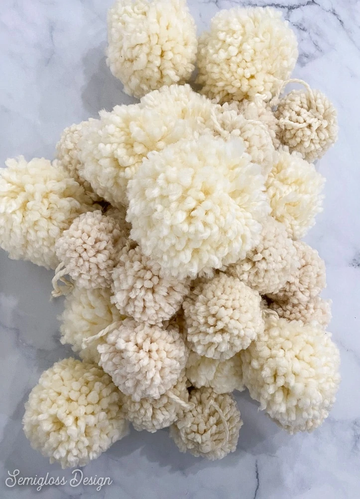 pile of white pom poms