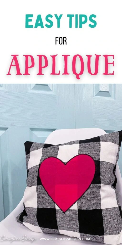 pink heart pillow on white chair