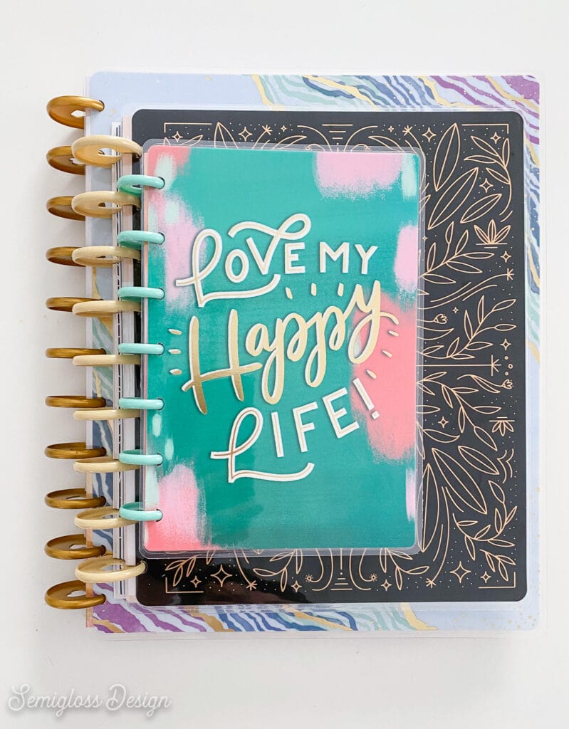 stack of happy planners