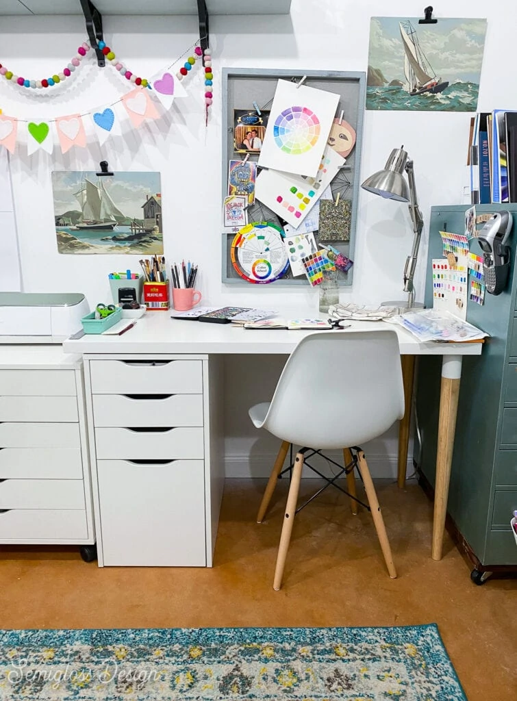 art desk with pinboard on wall