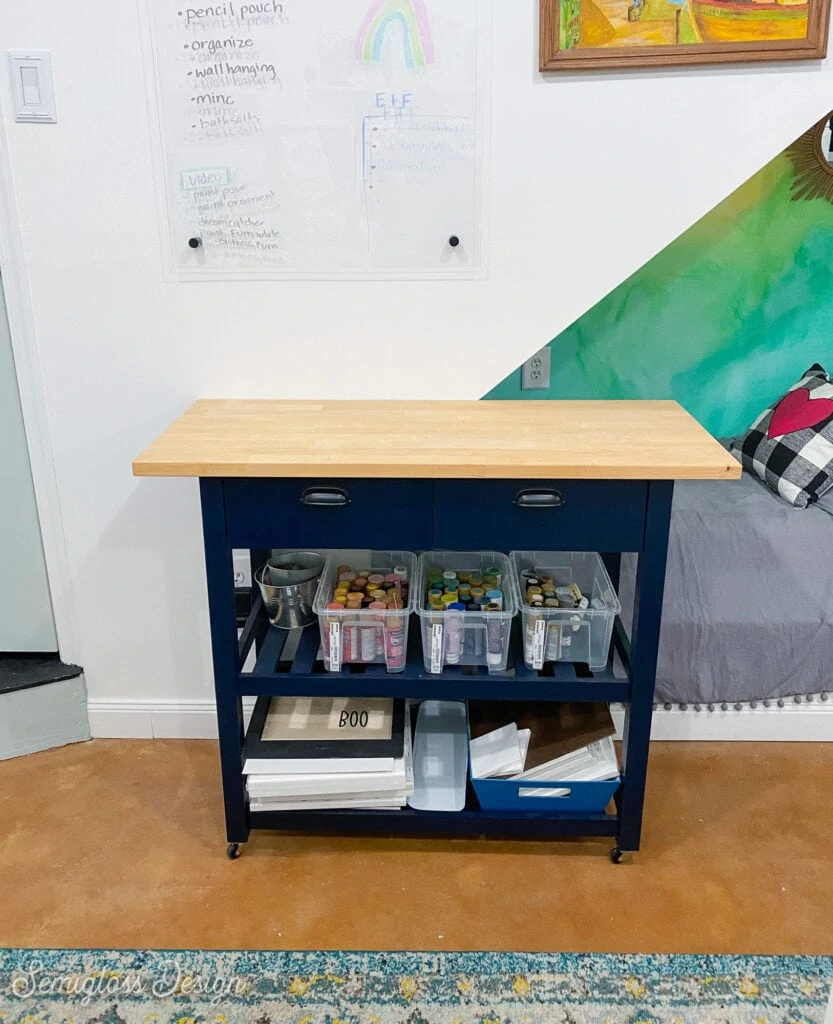 ikea forhoja cart holding paint and canvases