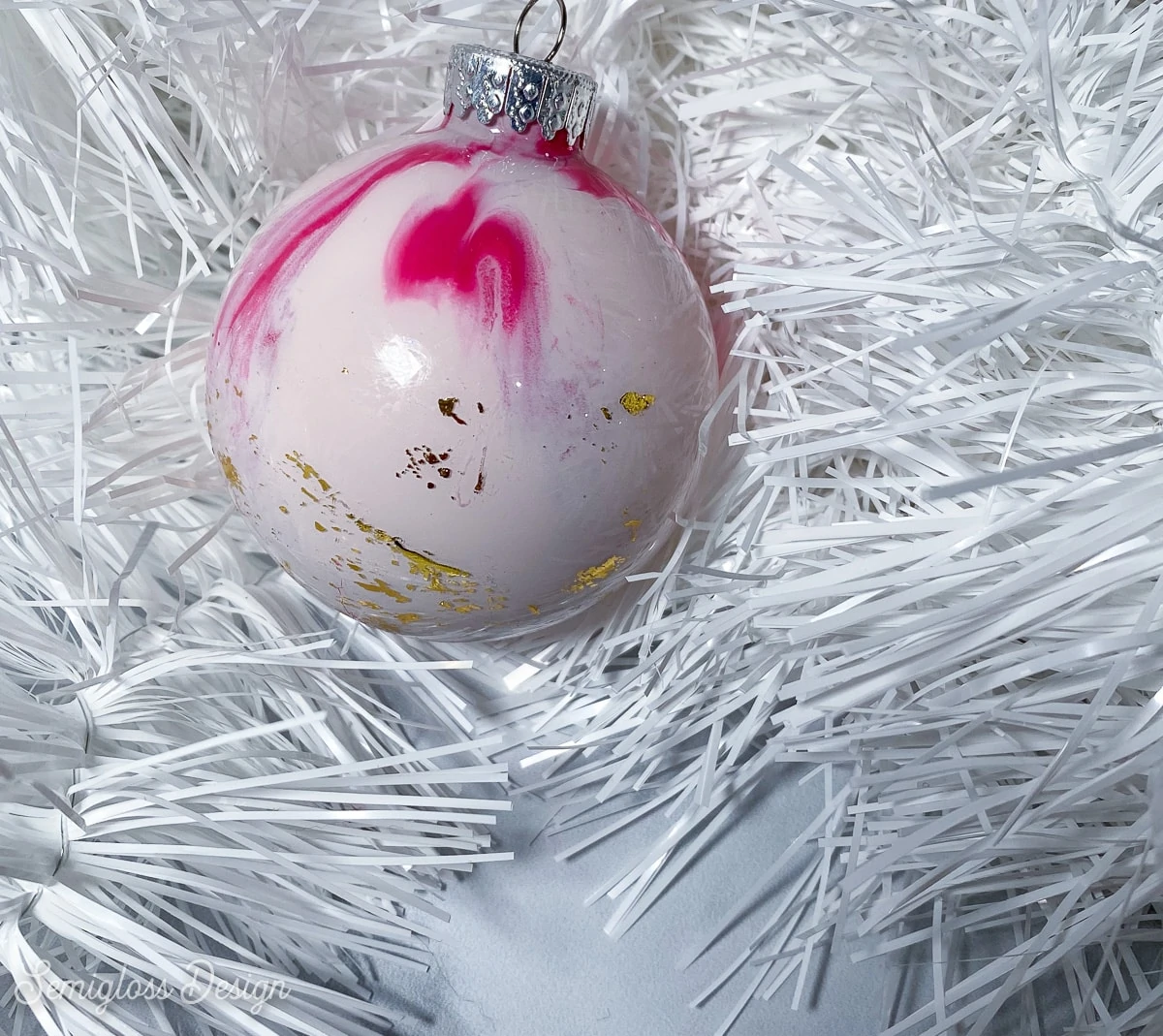 gold leaf on pink ornament