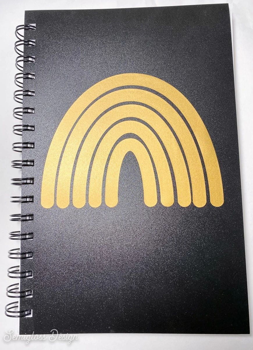 gold vinyl rainbow on sketchbook cover