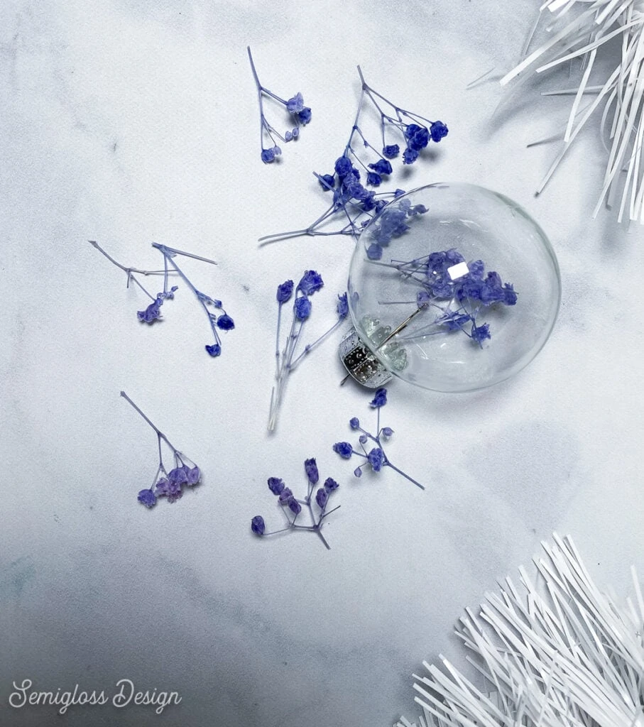 ornament filled with dried purple flowers