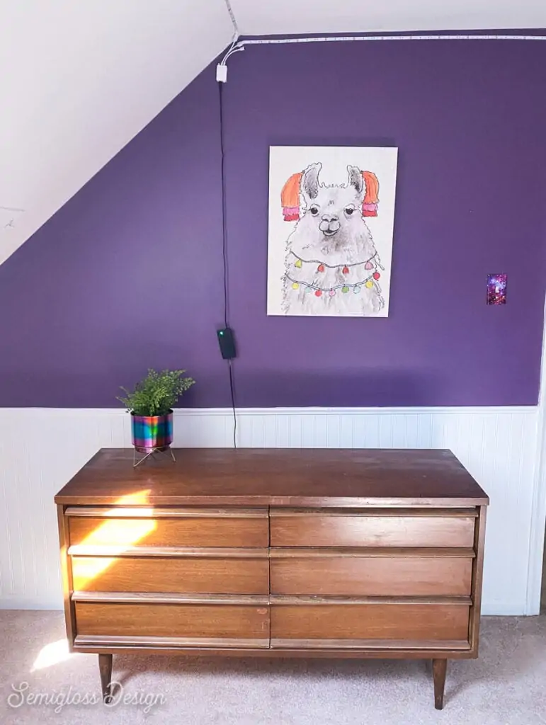 mcm dress in room with purple walls