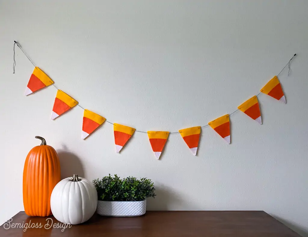 candy corn banner above dresser