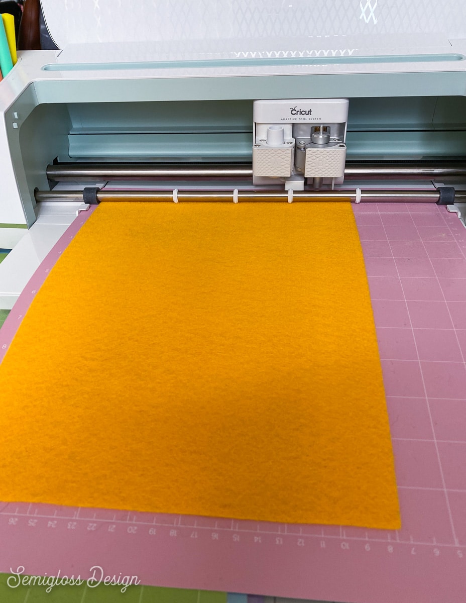 yellow felt on pink cricut mat