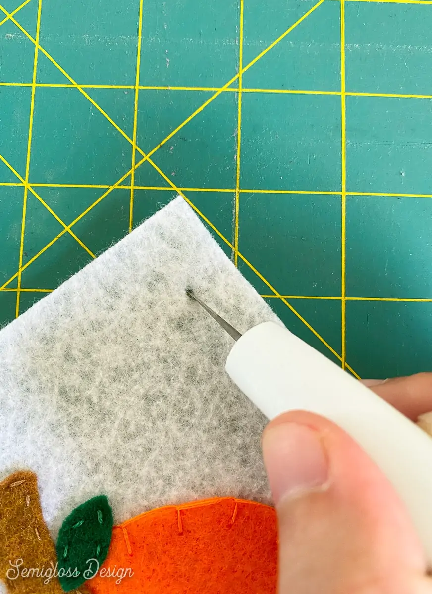 cutting slits in felt for string