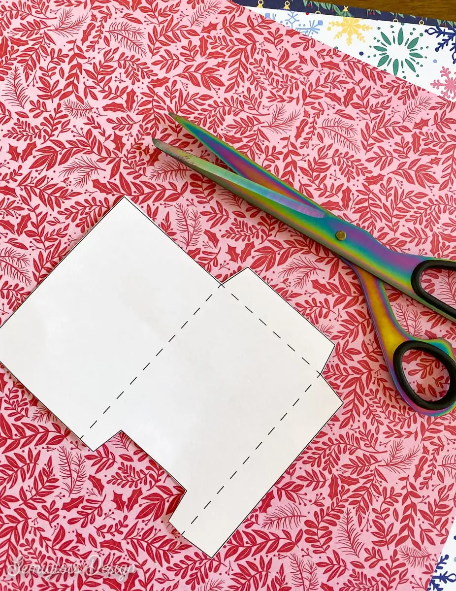 template, scissors, and pink floral paper