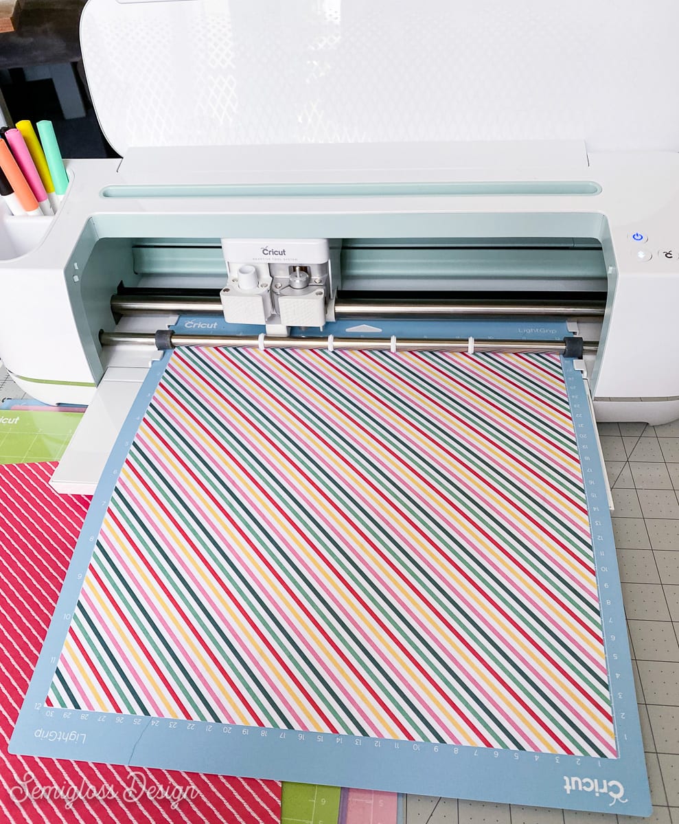 scrapbook paper on cricut mat