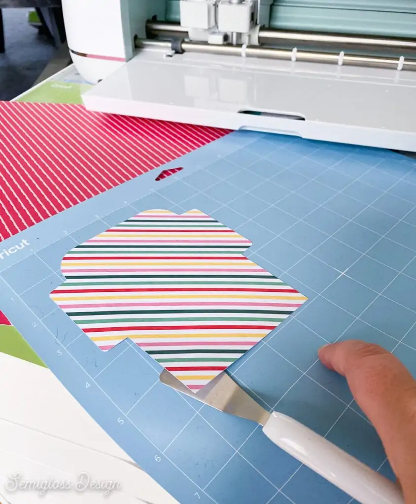 using Cricut spatula to remove paper design from mat