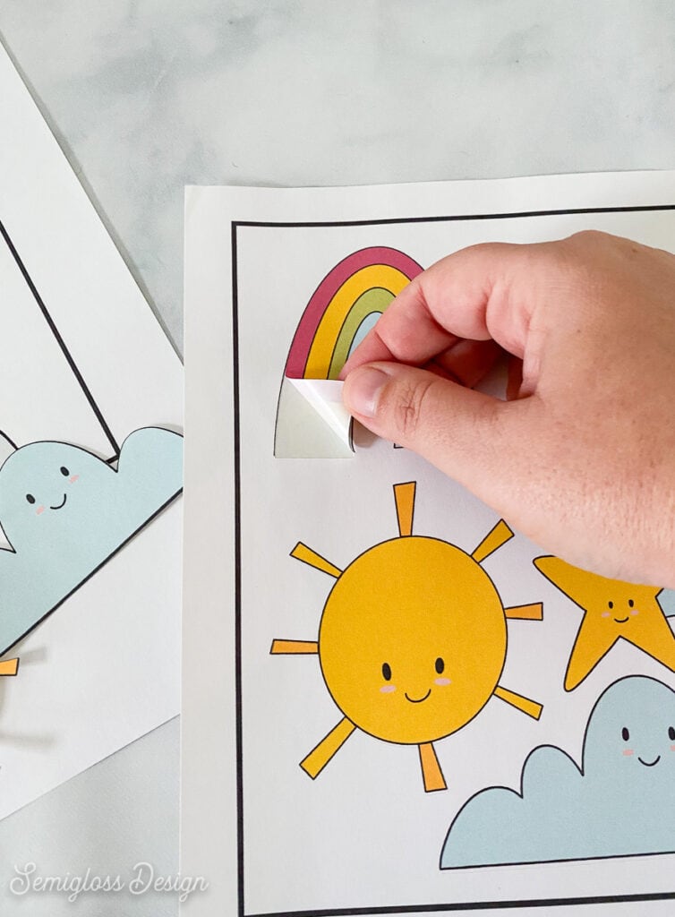 hand peeling rainbow sticker
