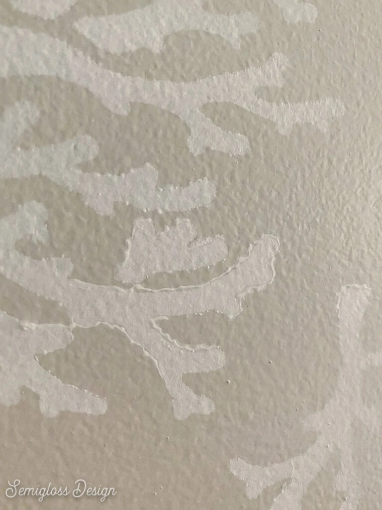 close up of textured stencil edges on wall