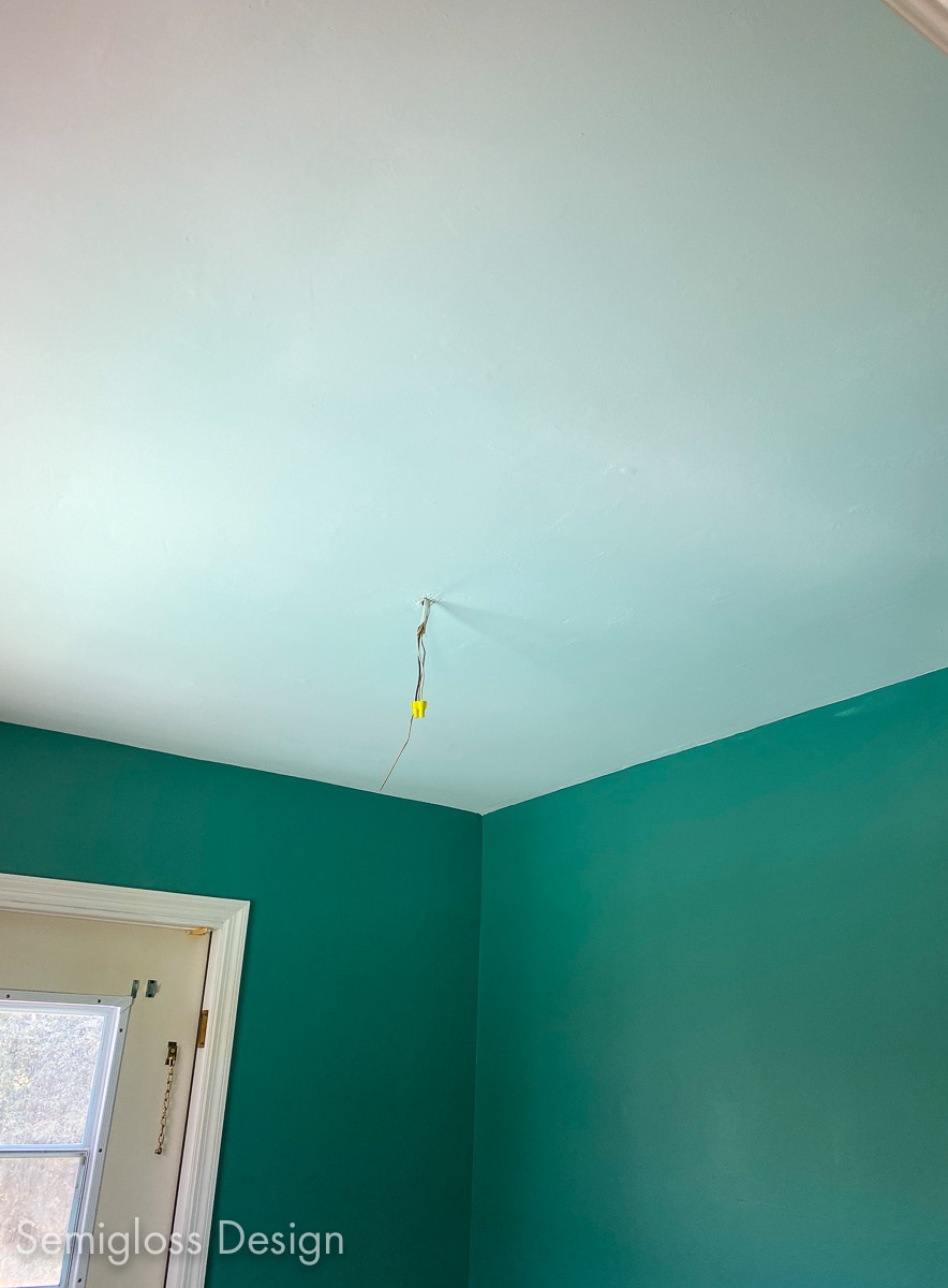 repainted ceiling in room with green walls
