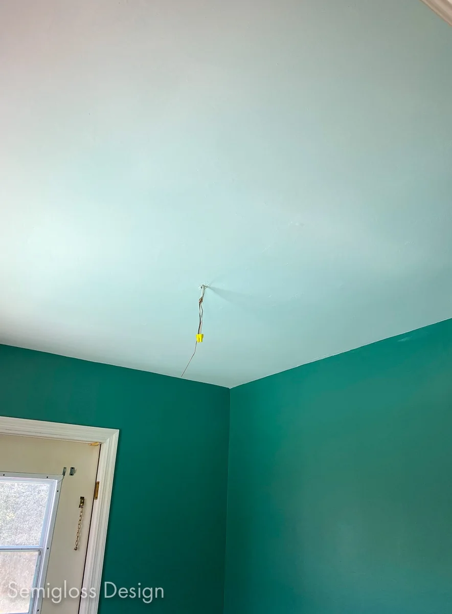 repainted ceiling in room with green walls