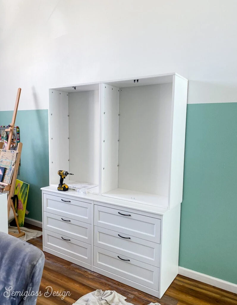 installing craft storage cabinet