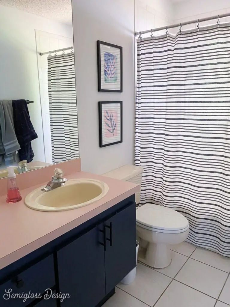 bathroom with pink countertop