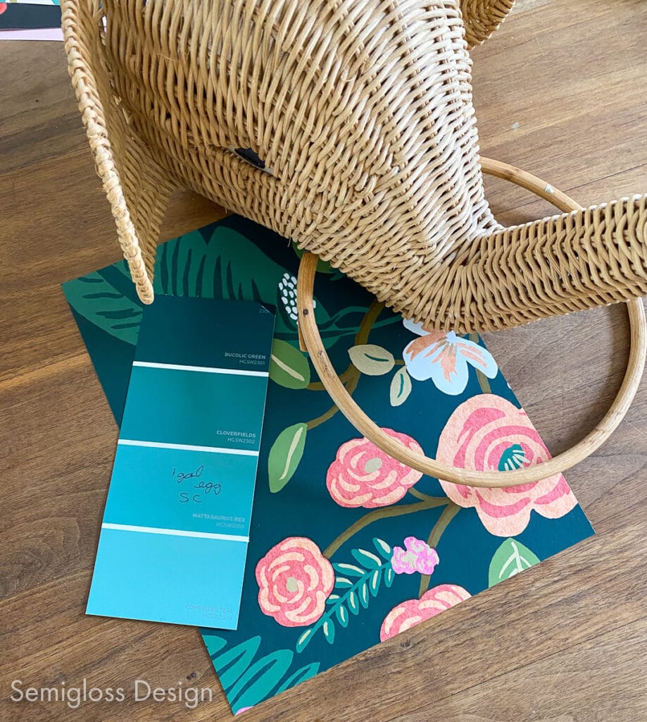 green paint swatch, wallpaper sample, and wicker elephant head