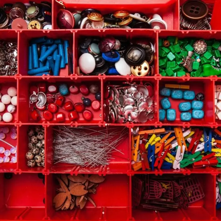 organized beads in a red container