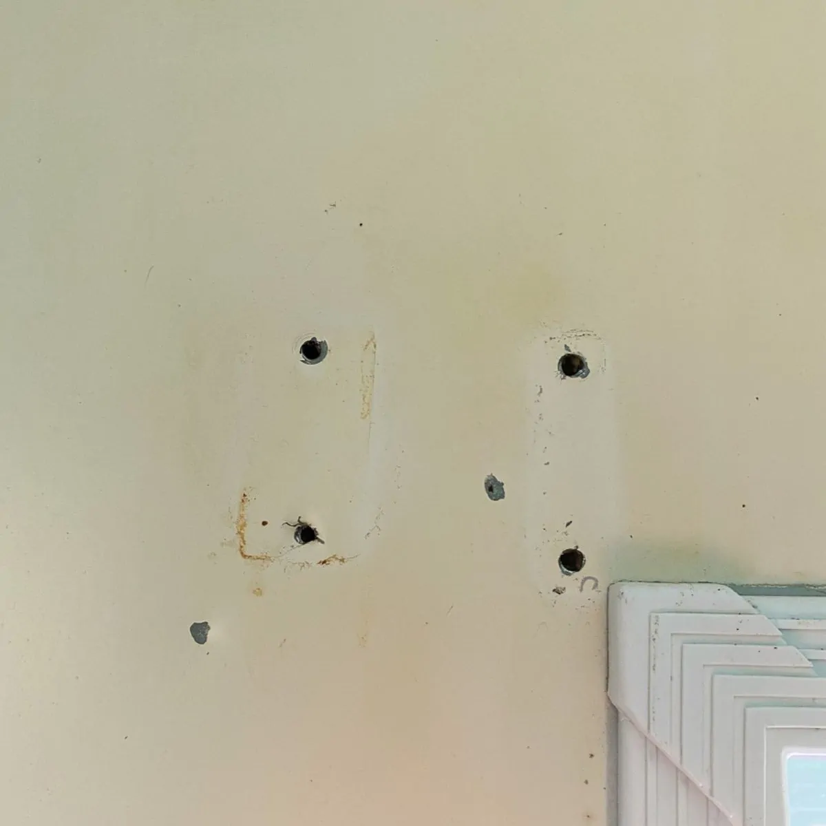 screw holes in metal door