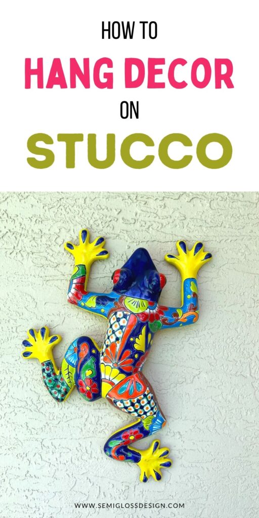 ceramic frog on stucco wall