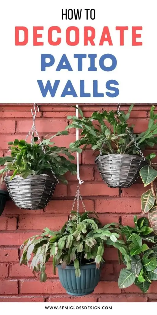 plants hanging against brick wall