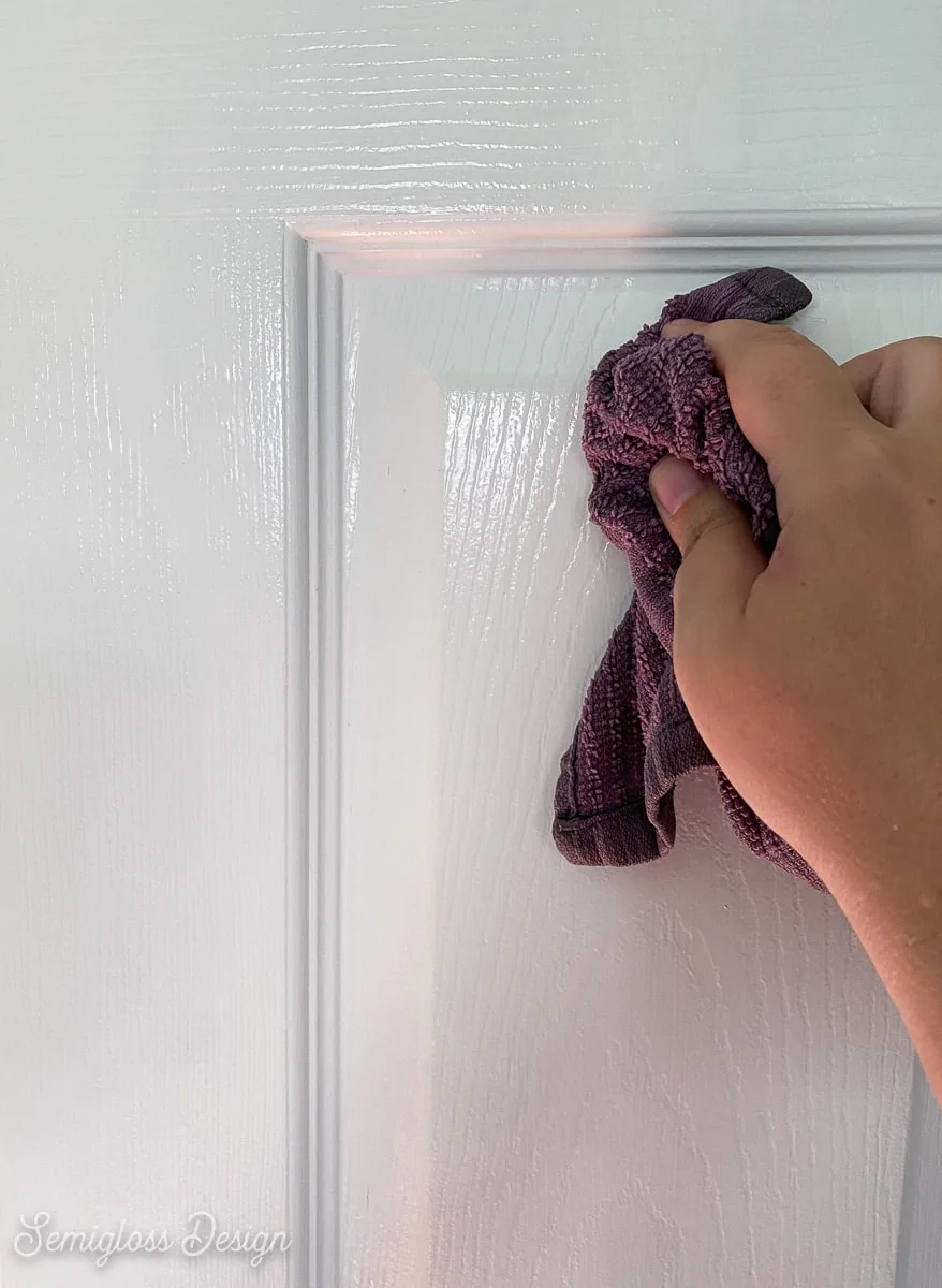 cleaning door with rag