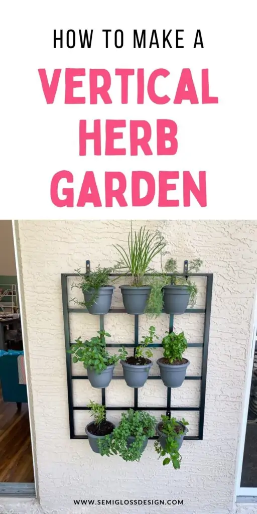 herb garden on black metal trellis on wall