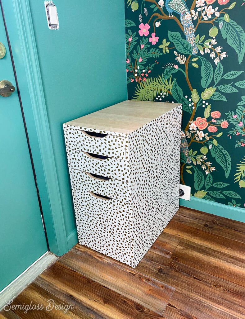 alex cabinet with gold dot wallpaper
