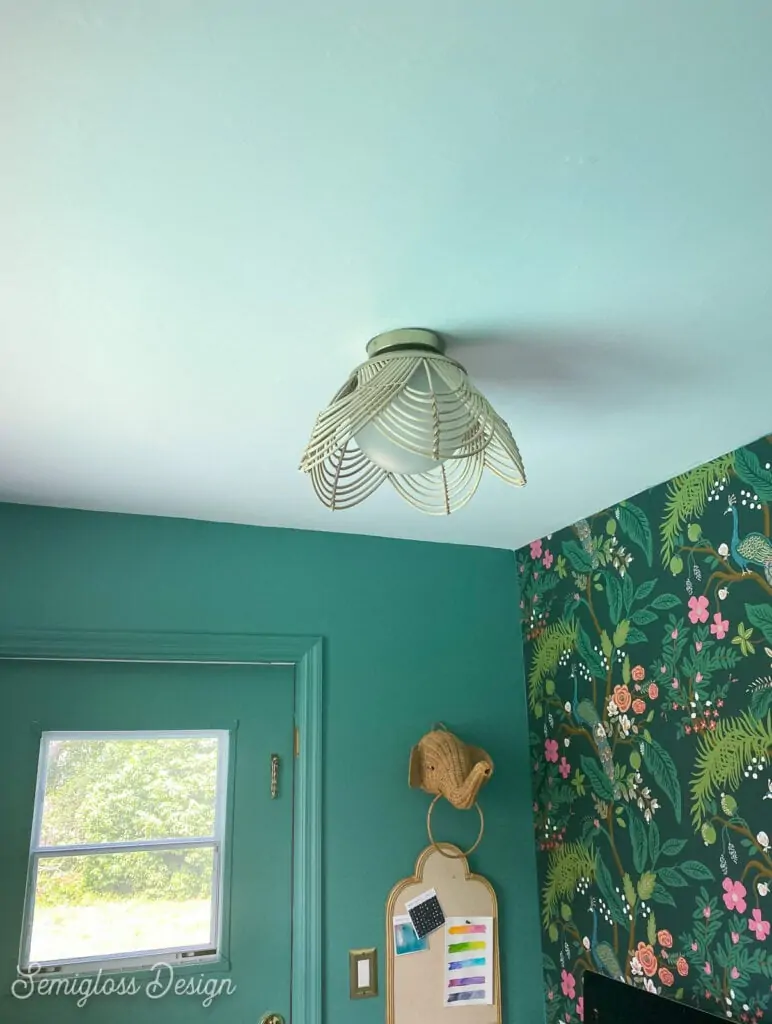 rattan light in green room