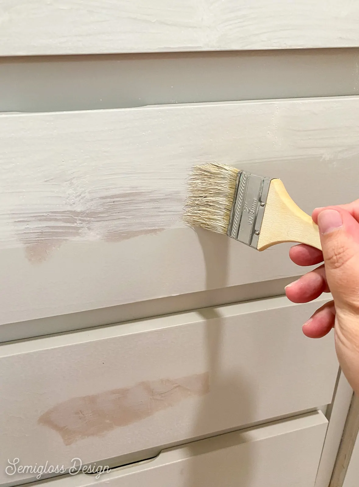 painting primer on kitchen cabinet drawers