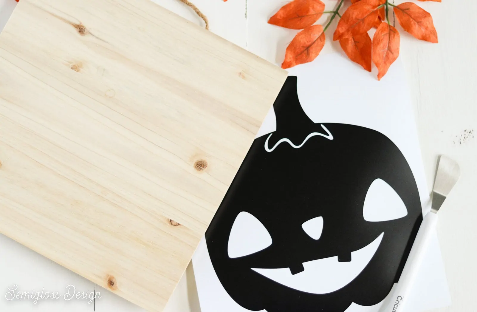 weeded pumpkin design and wood sign