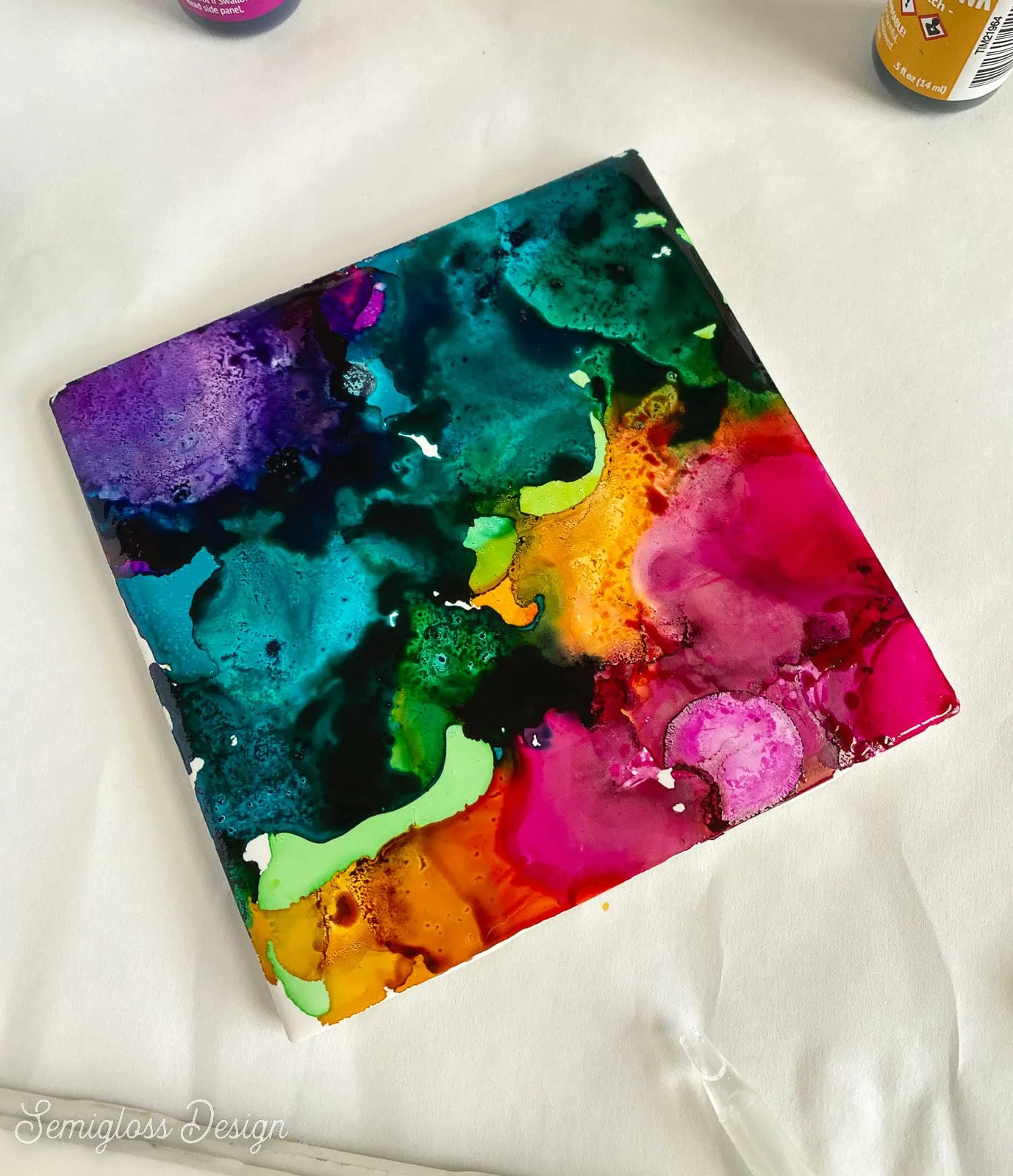 rainbow colored ink coaster