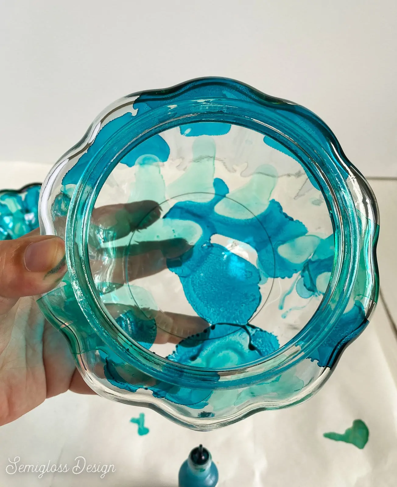 adding teal and green ink to glass pumpkin jar