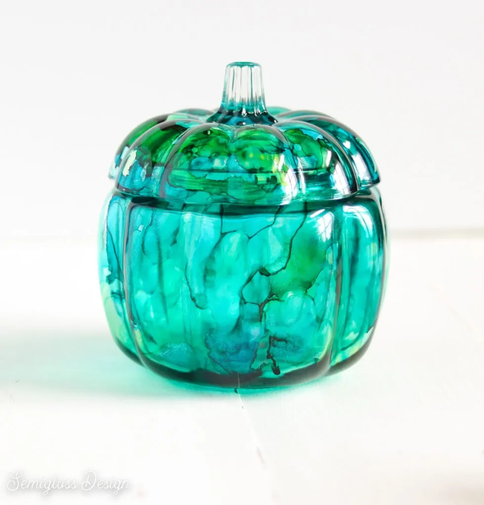 teal and green glass pumpkin painted with alcohol ink