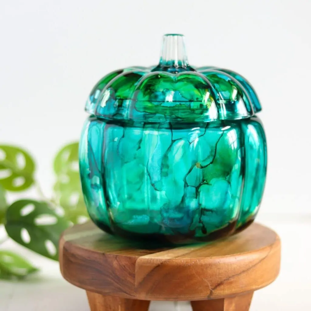 teal glass pumpkin painted with alcohol ink