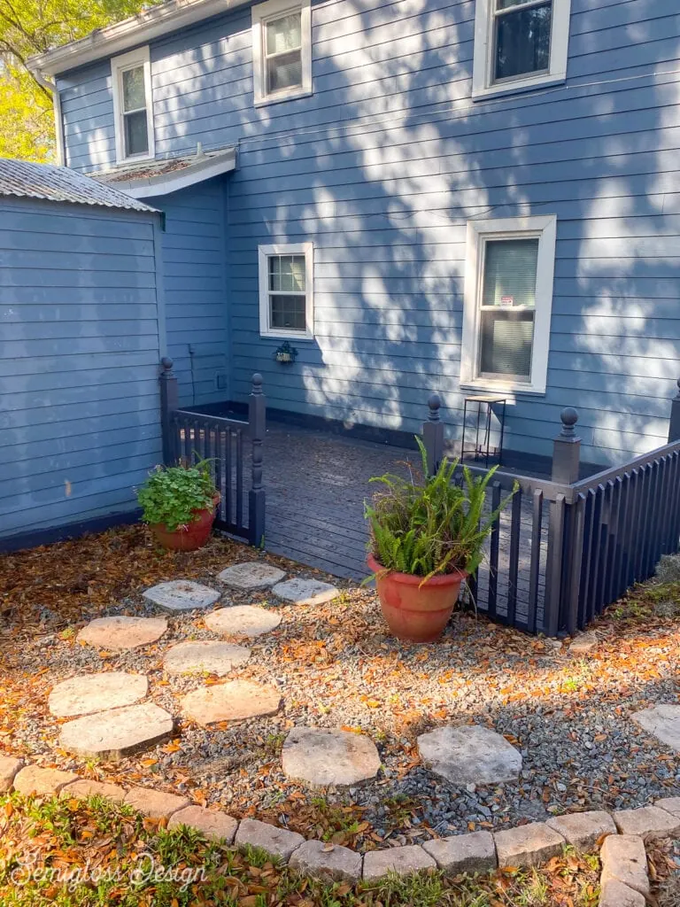 backyard with blue house