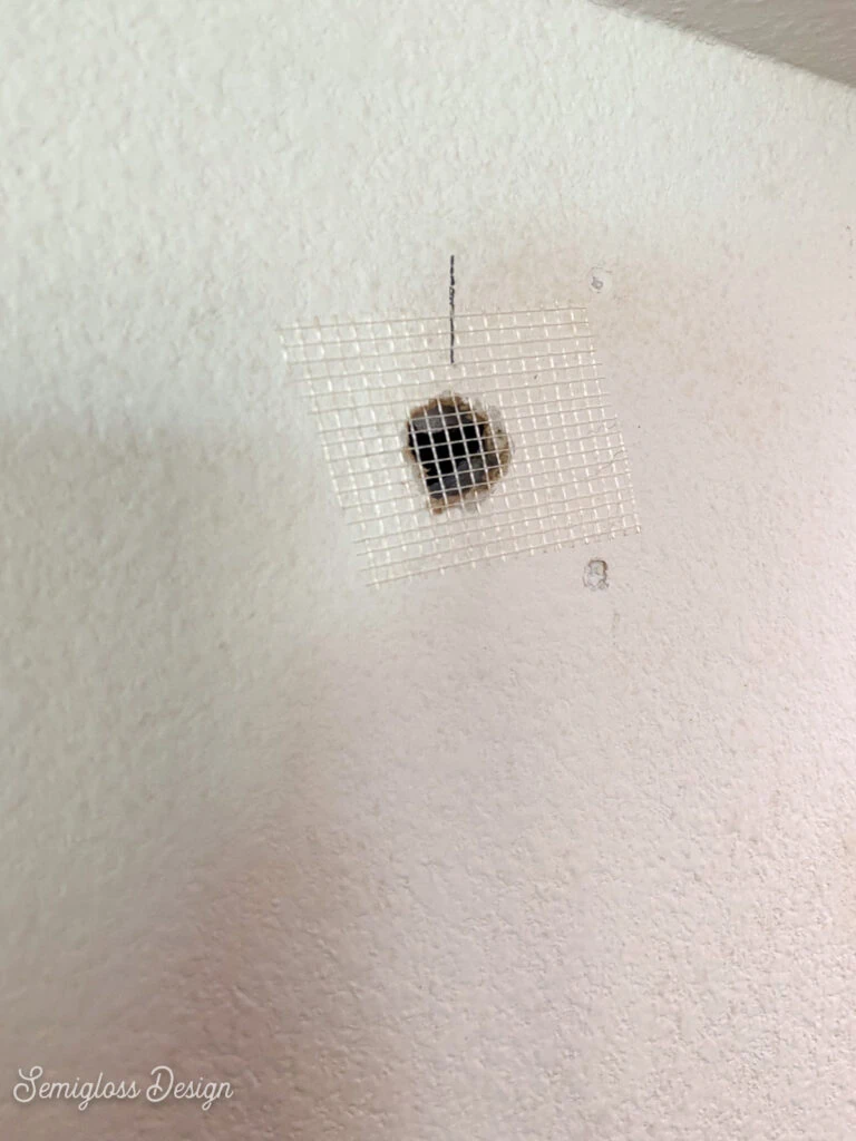 drywall tape on hole