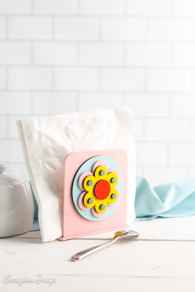 pink napkin holder with retro flower design